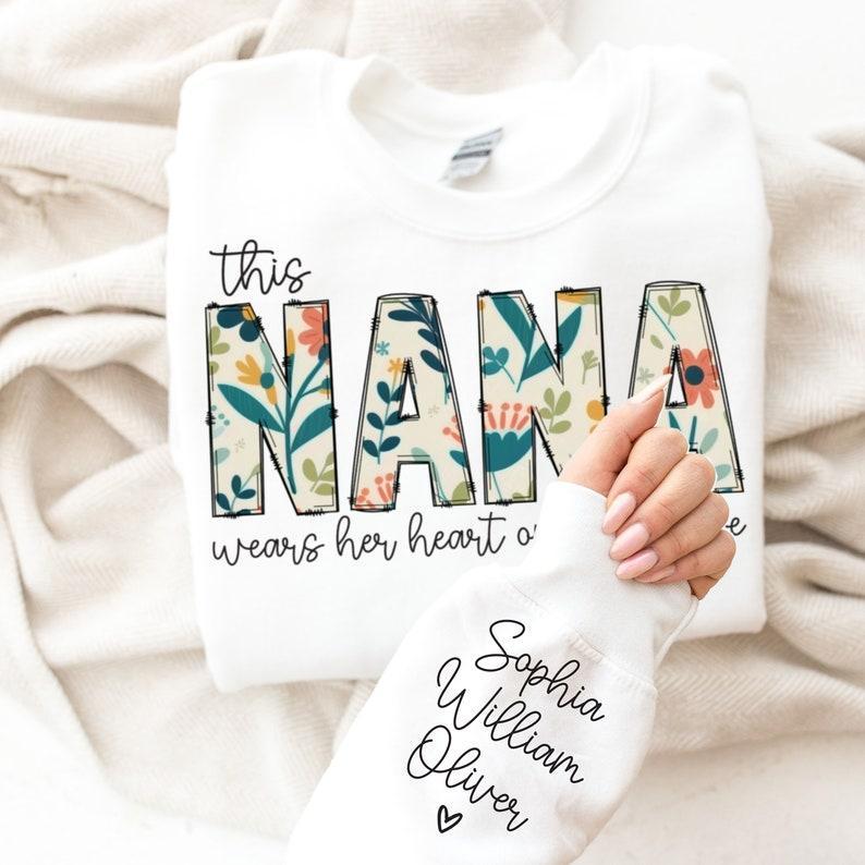 Custom Sweatshirt for Nana, Christmas Gift for Nana, I Wear My Heart On My Sleeve, Nana Sweatshirt with Grandkids Name on Sleeve, Nana Gift