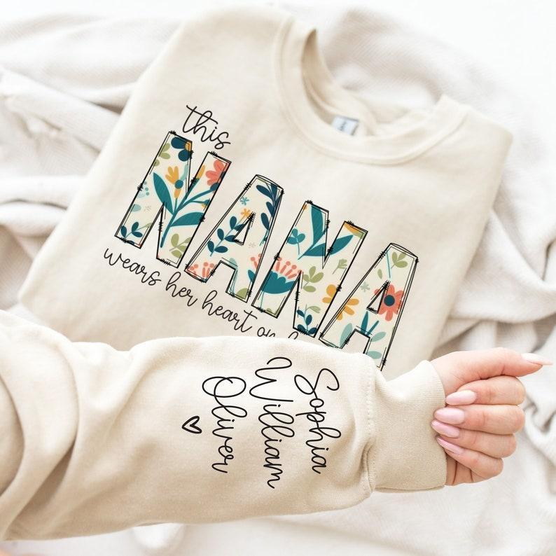 Custom Sweatshirt for Nana, Christmas Gift for Nana, I Wear My Heart On My Sleeve, Nana Sweatshirt with Grandkids Name on Sleeve, Nana Gift